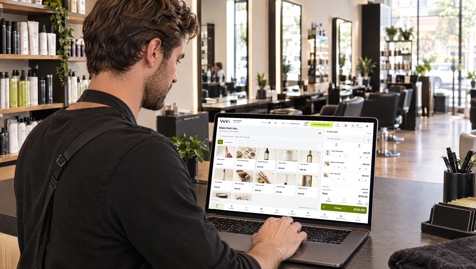 VoVi sales screen with shampoo and haircare product photos at salon reception.